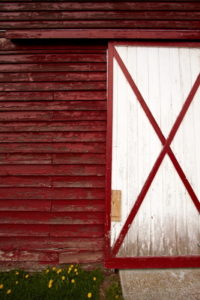 Wall And The Door On The Old Red Barn In The Countryside Warren